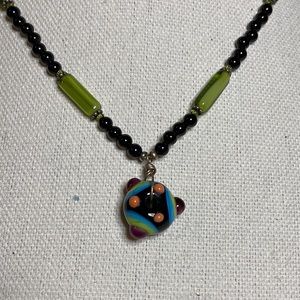 Interesting artisan lamp work bead necklace